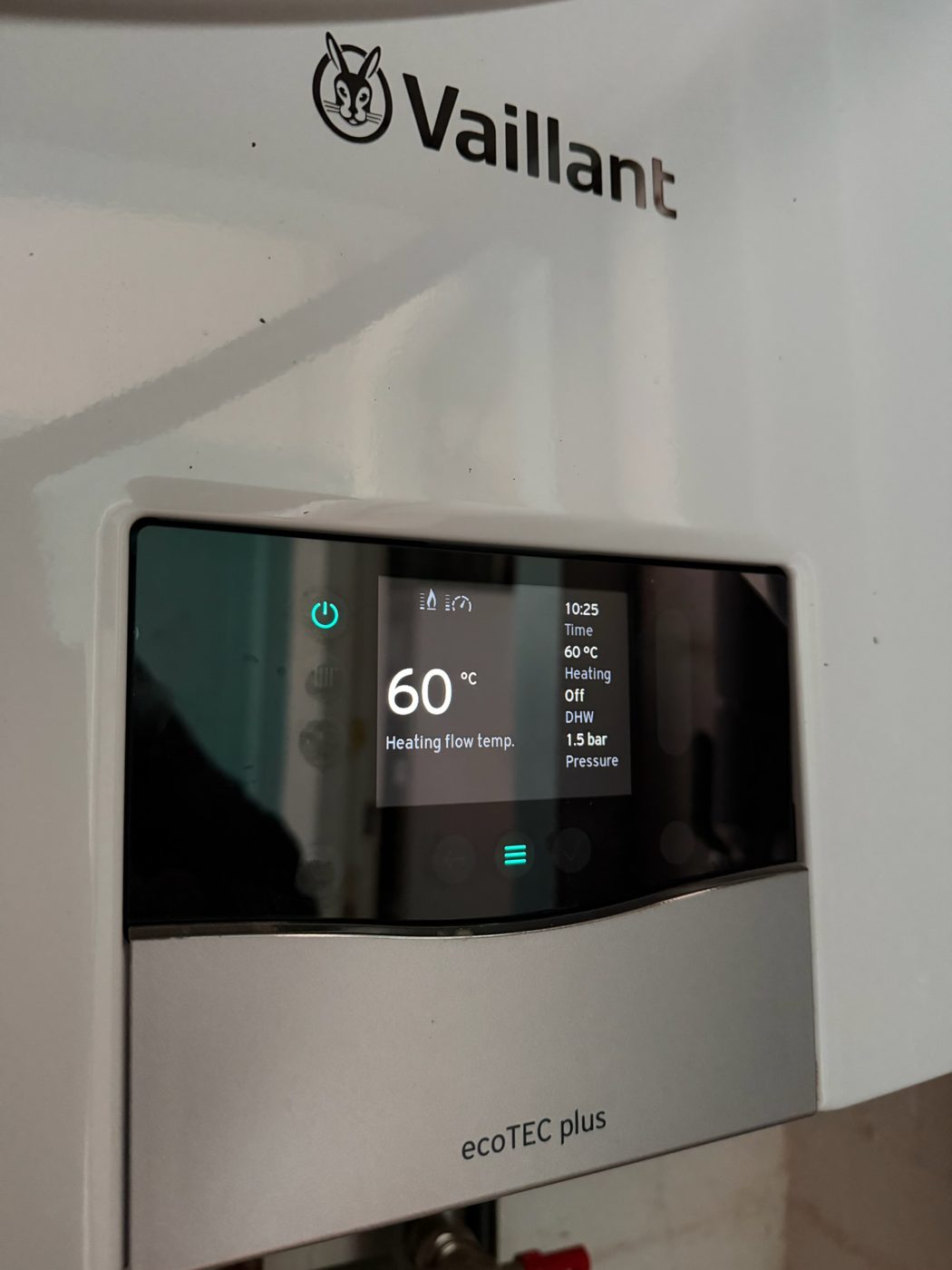 Vaillant boiler controls being checked during a service