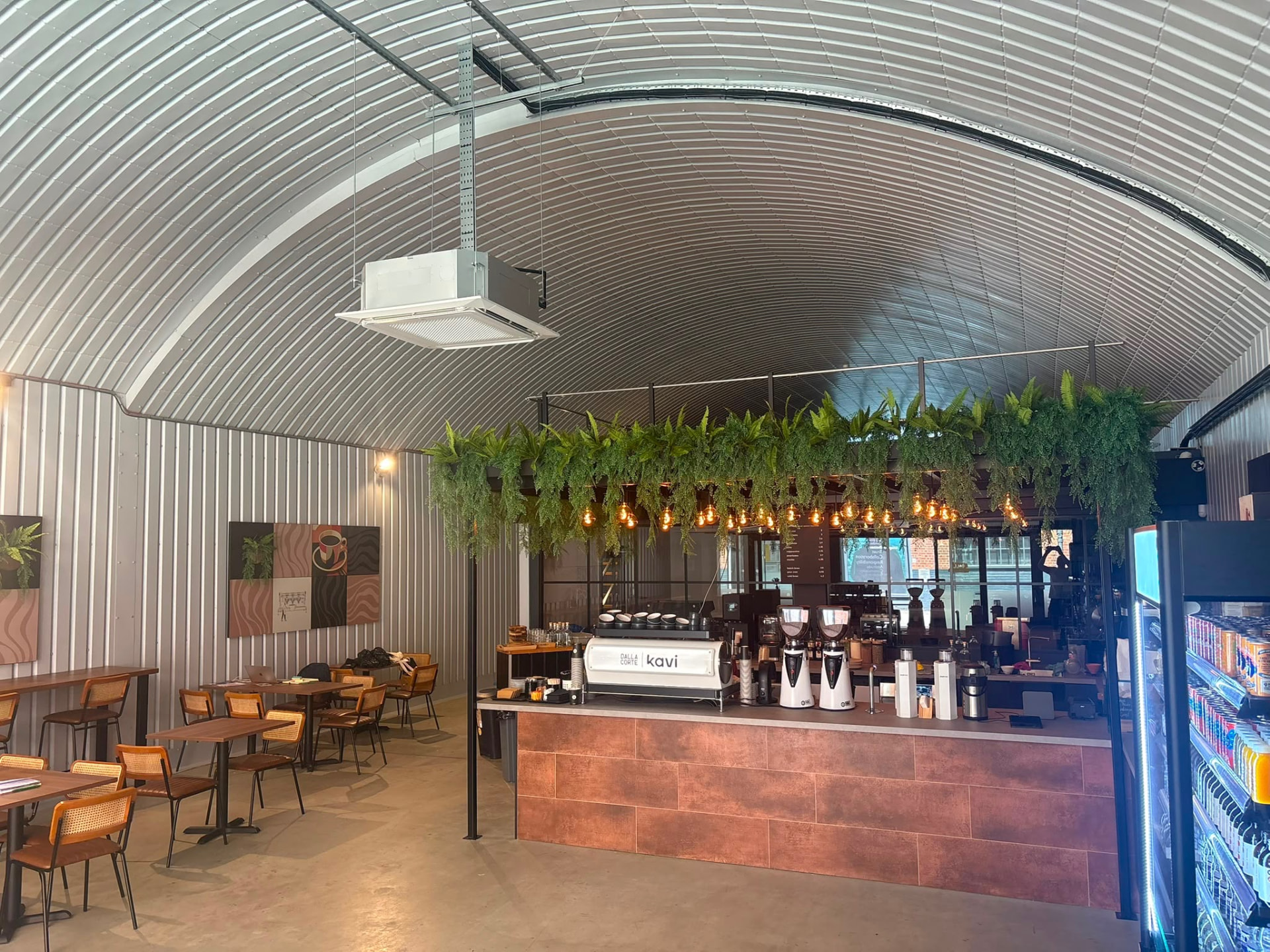 Finished showroom coffee counter in Southwark with a ceiling cassette unit overhead